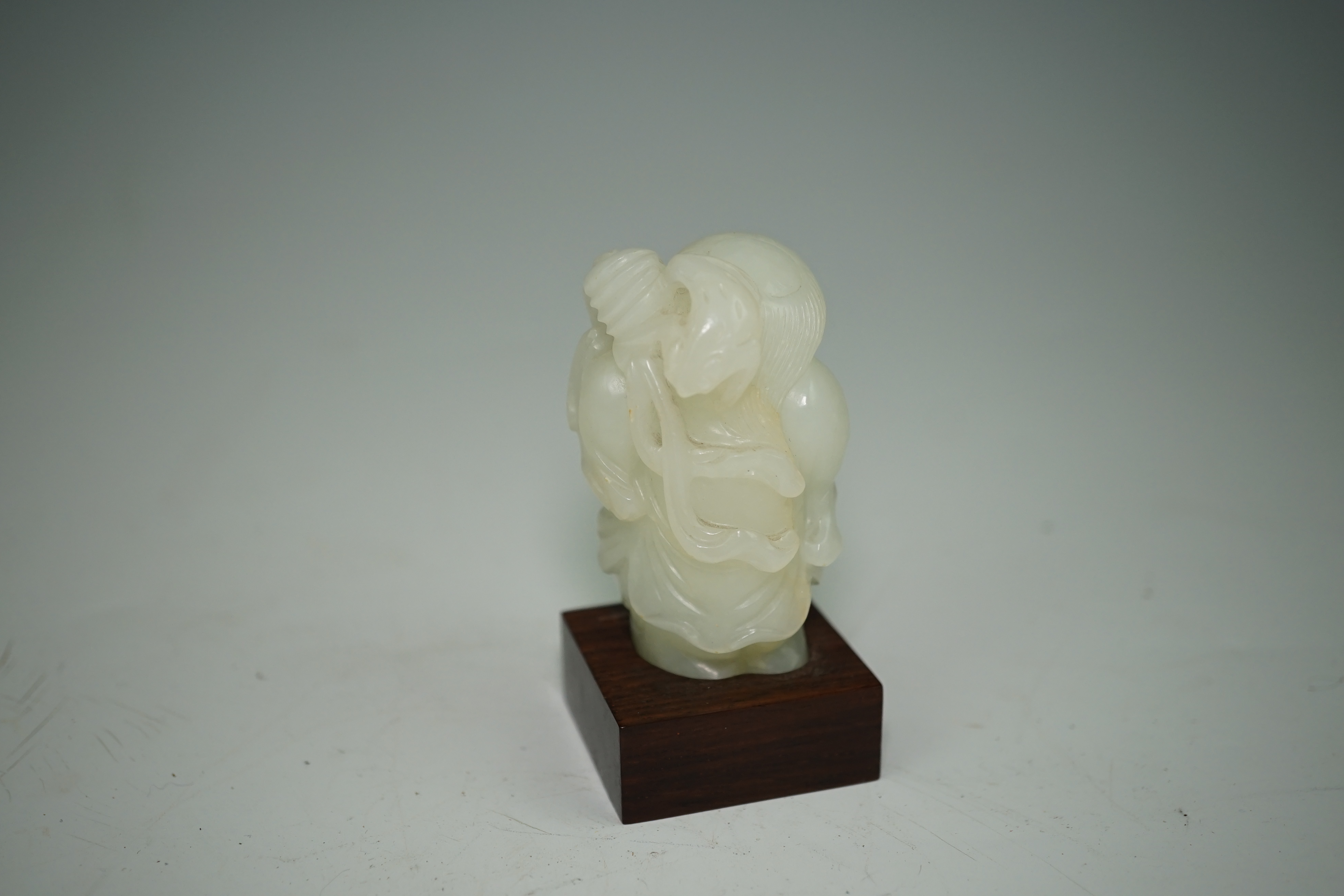 A Chinese white jade figure of Liu Hai, 18th-19th century